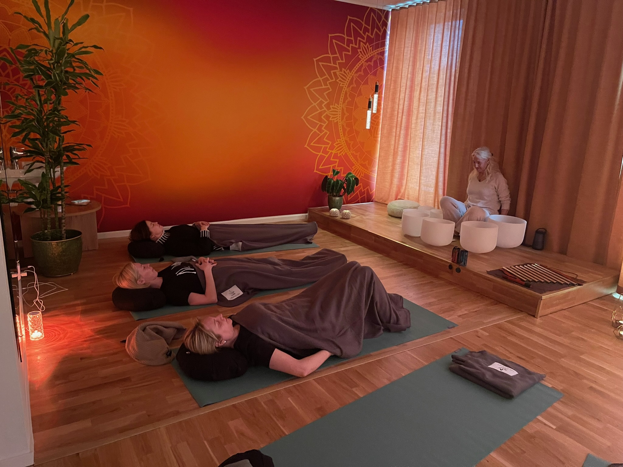 Participants resting during a group sound meditation